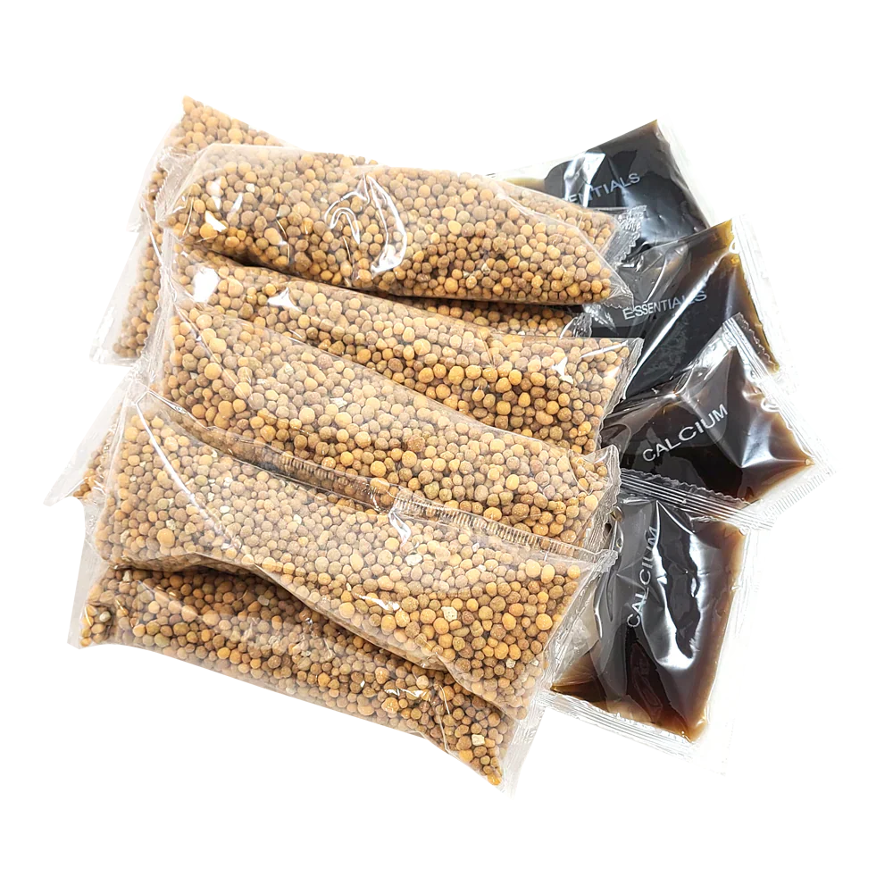 Clear plastic bags containing small pellets with visible text on a white background